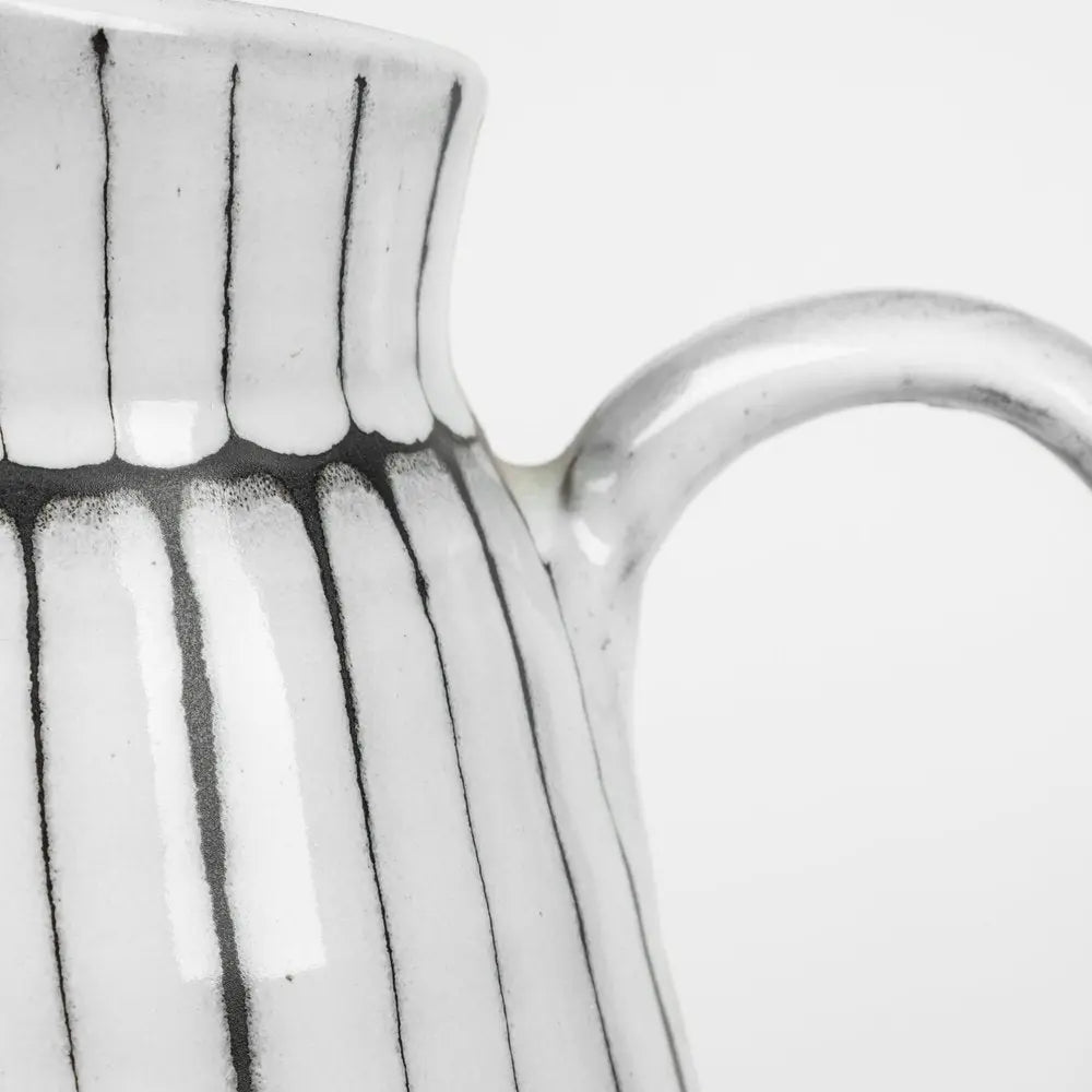 13" Black And White Ceramic Cylinder Jug Vase With Sculptural Details HomeRoots