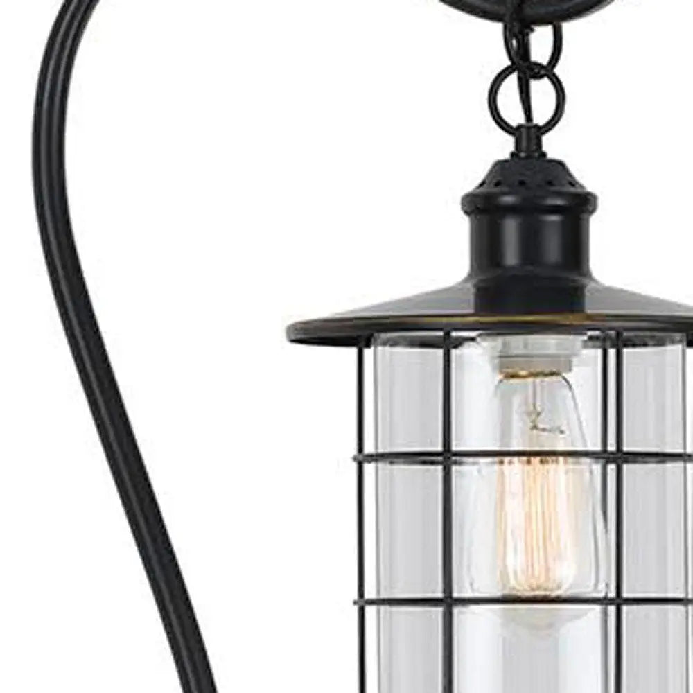 60" Antiqued Bronze Lantern Style Floor Lamp With Glass and Metal Shade HomeRoots