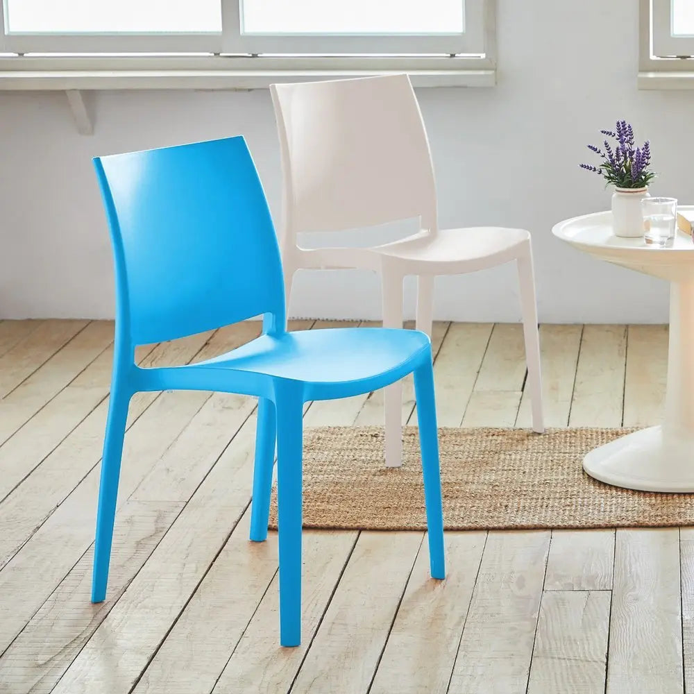 Set of Four Blue Heavy Duty Plastic Outdoor Stacking Dining Chairs - NOBLE HOME INTERIORS
