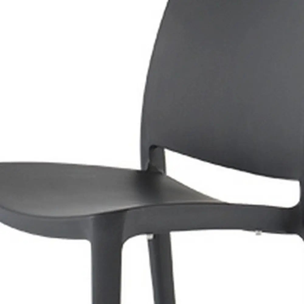 Set of Four Dark Gray Heavy Duty Plastic Outdoor Stacking Dining Chairs - NOBLE HOME INTERIORS