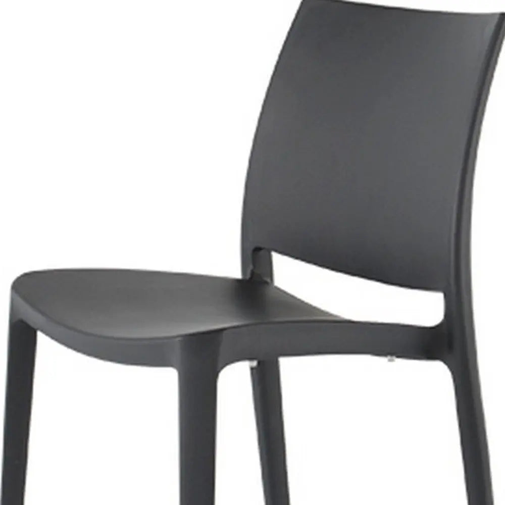 Set of Four Dark Gray Heavy Duty Plastic Outdoor Stacking Dining Chairs - NOBLE HOME INTERIORS