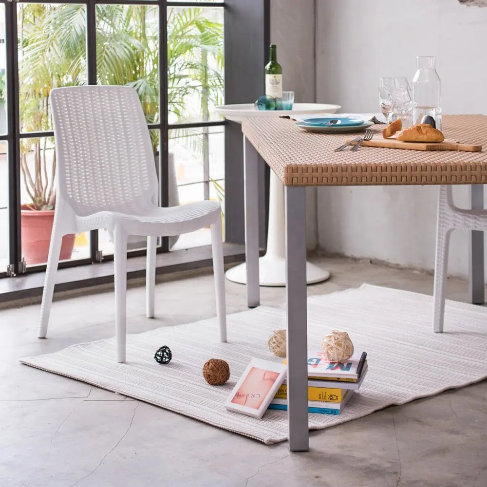 Set of Four White Heavy Duty Plastic Outdoor Stacking Dining Chairs - NOBLE HOME INTERIORS