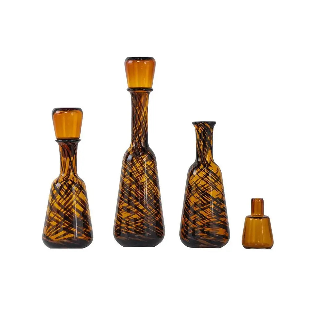 Set of Three Amber Abstract Swirl Glass Decorative Bottles With Stoppers - NOBLE HOME INTERIORS