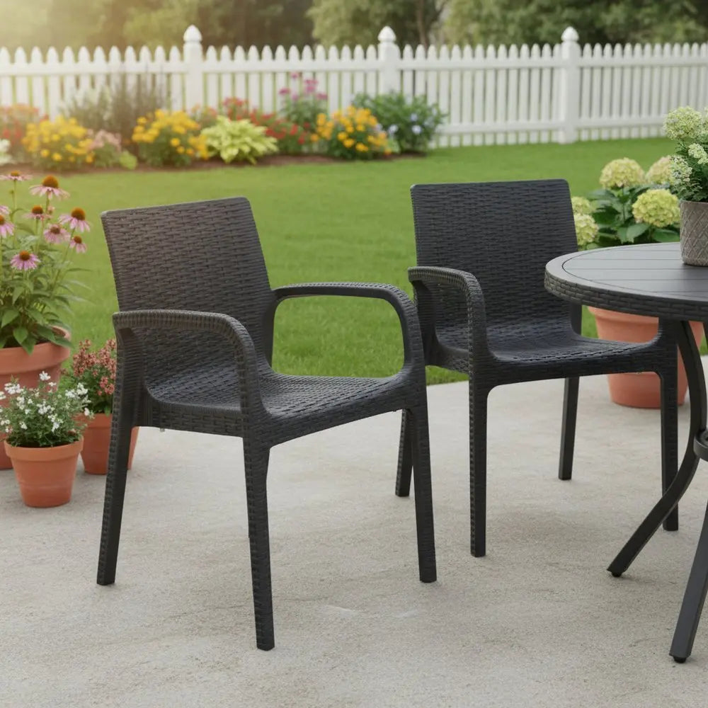 Set of Two Black Faux Rattan Heavy Duty Plastic Outdoor Stacking Arm Chairs - NOBLE HOME INTERIORS