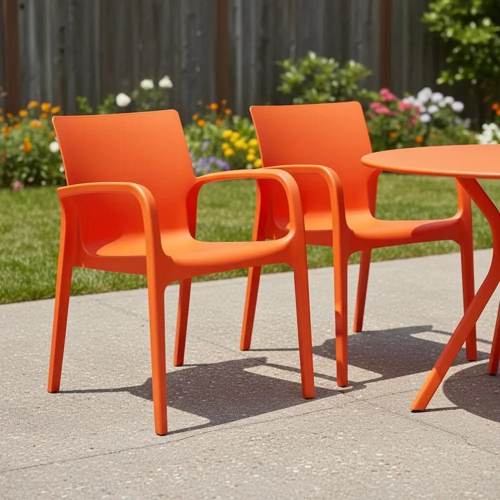 Set of Two Orange Heavy Duty Plastic Outdoor Stacking Dining Chairs - NOBLE HOME INTERIORS
