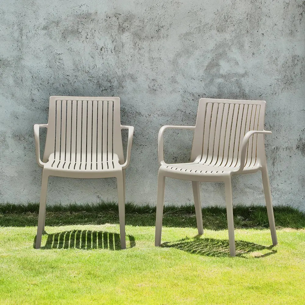 Set of Two Taupe Heavy Duty Plastic Outdoor Stacking Arm Chairs - NOBLE HOME INTERIORS