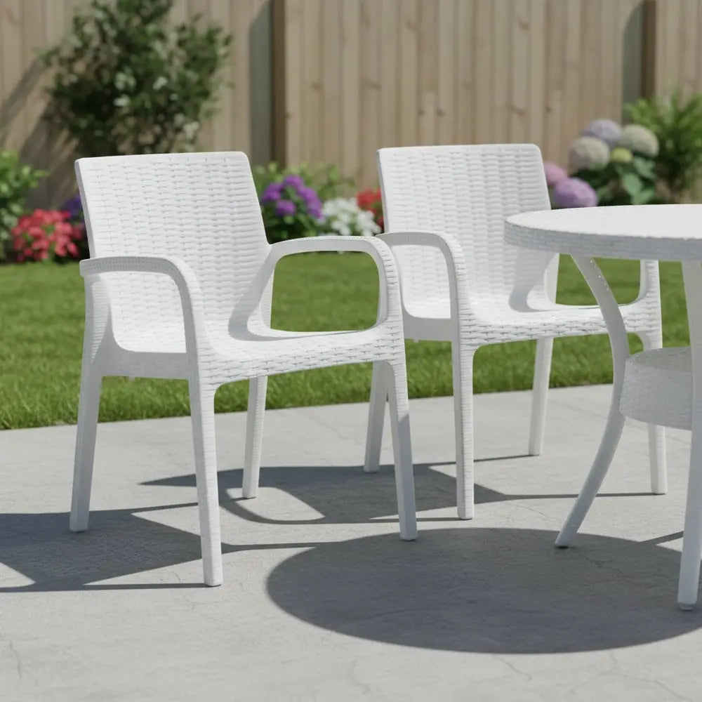 Set of Two White Faux Rattan Heavy Duty Plastic Outdoor Stacking Arm Chairs - NOBLE HOME INTERIORS