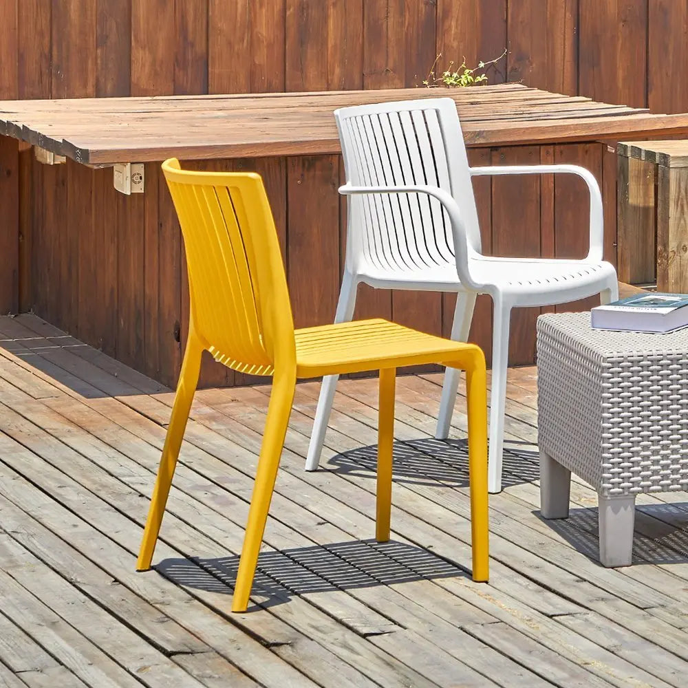 Set of Two White Heavy Duty Plastic Outdoor Stacking Accent Chairs - NOBLE HOME INTERIORS